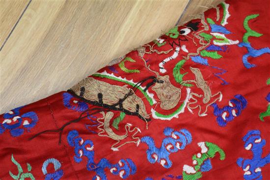 A Chinese embroidered silk dragon robe, early 20th century